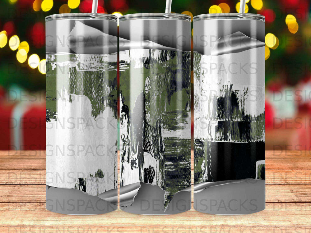 Tumblers with abstract camouflage pattern in green, black, and white.