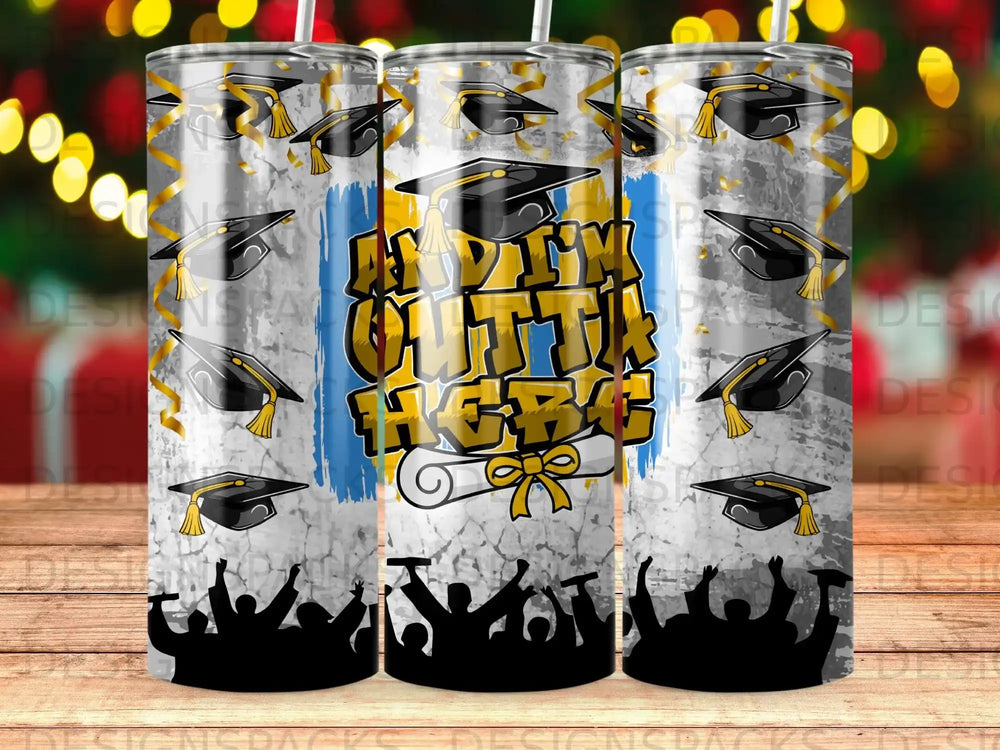 Graduation tumbler with caps, diplomas, and celebrating crowd silhouette.
