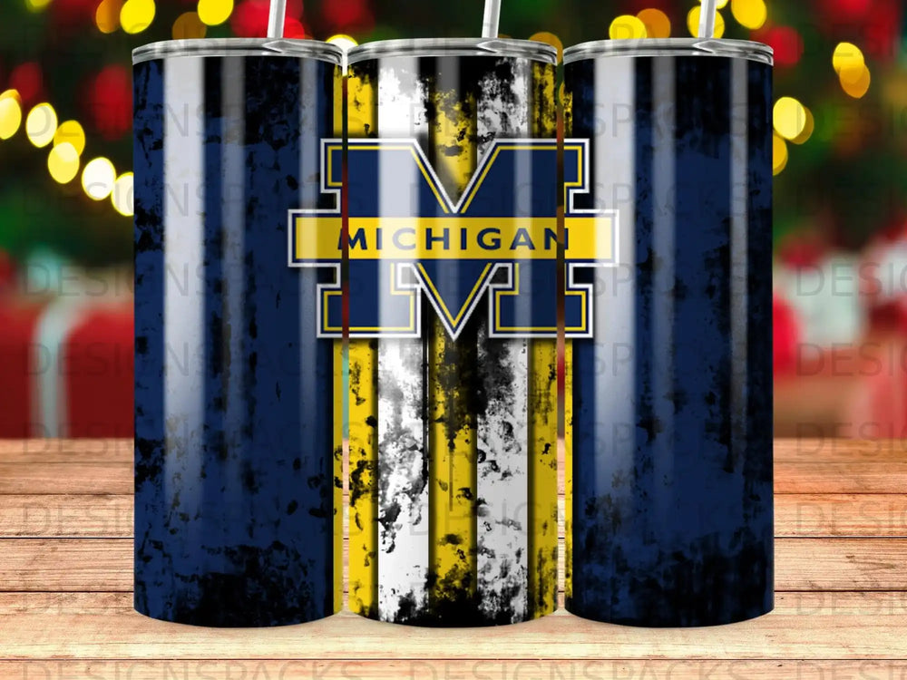 Michigan Wolverines logo on a blue and yellow striped tumbler.