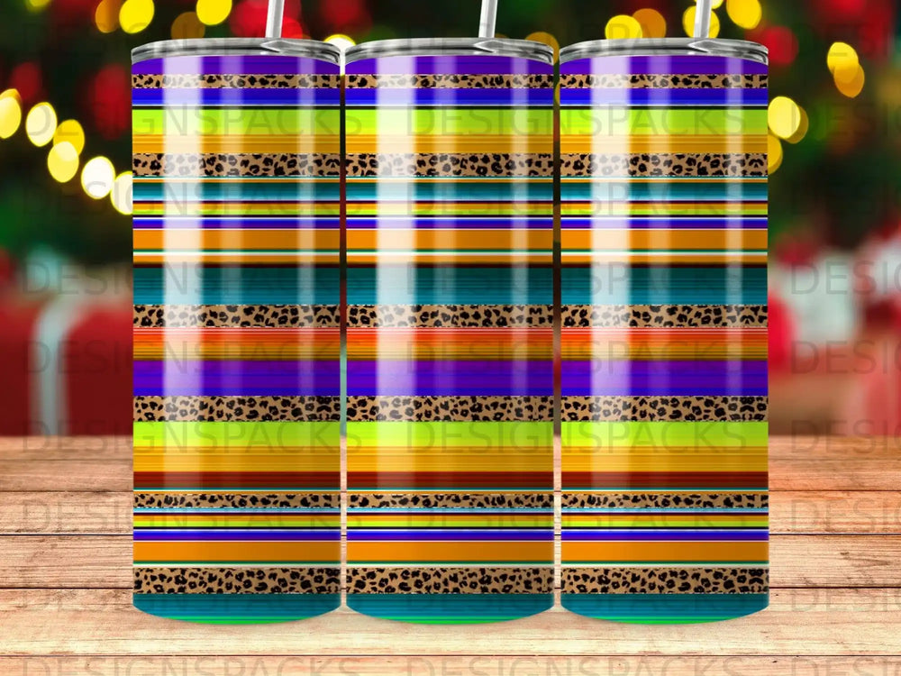 Striped tumbler with leopard print accents and bokeh lights background.
