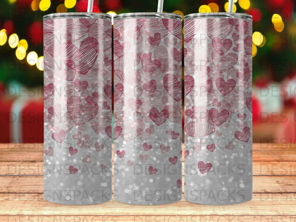Pink sketched hearts pattern on a silver glitter background tumbler.