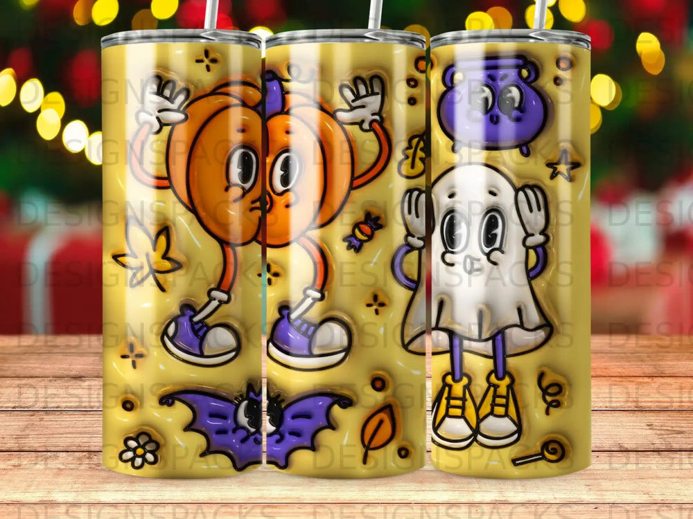 Three Halloween-themed tumblers with a pumpkin, ghost, and bat.