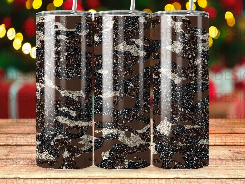 Camouflage tumbler with glitter accents and bokeh background.