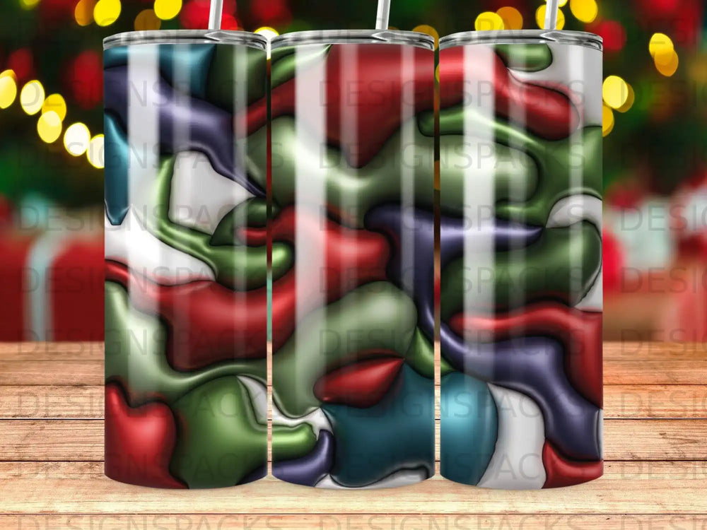 Three tumblers with a wavy, abstract pattern of red, green, and blue.