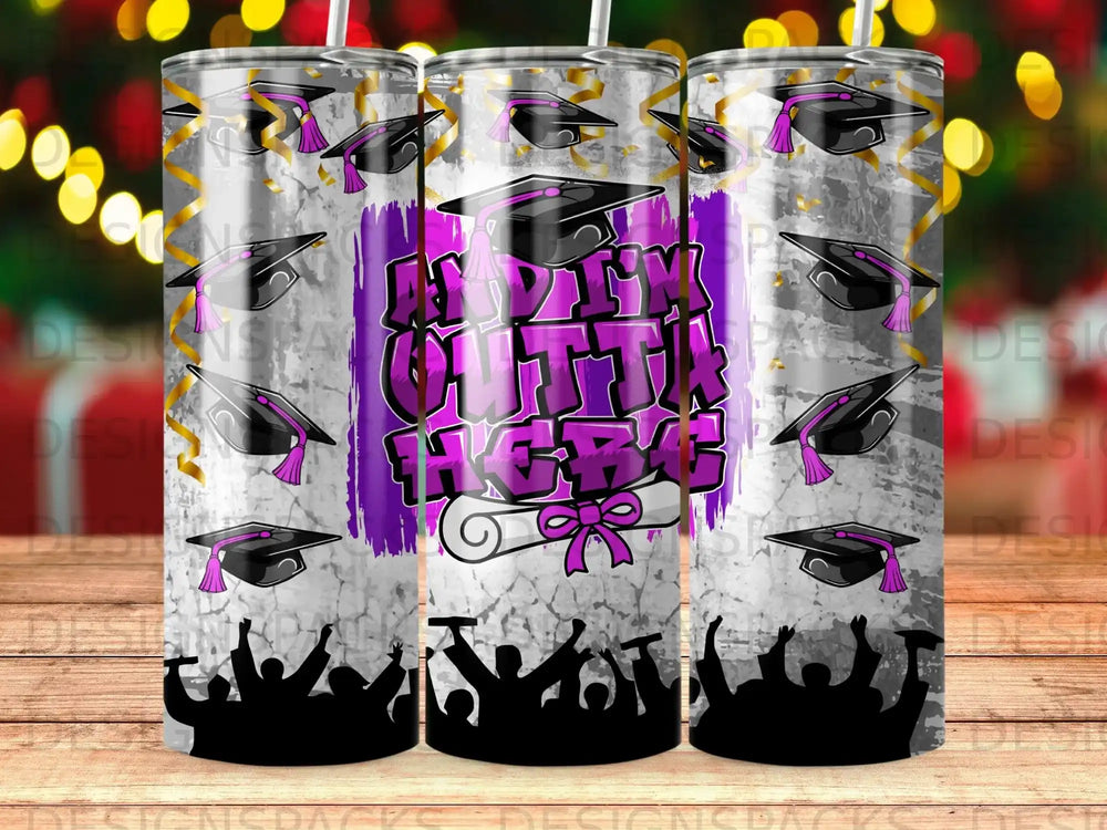 Graduation caps, diploma, and cheering crowd pattern on a tumbler.