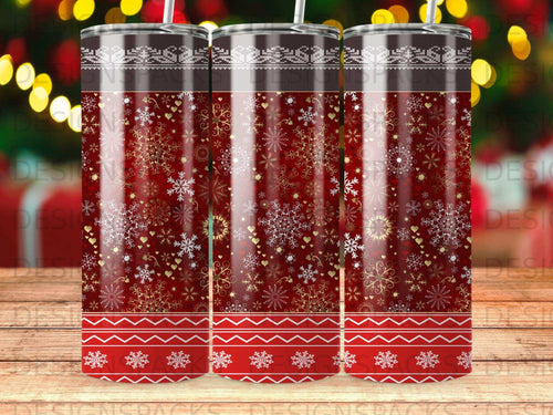 Three tumblers with red, snowflake, and striped holiday pattern.