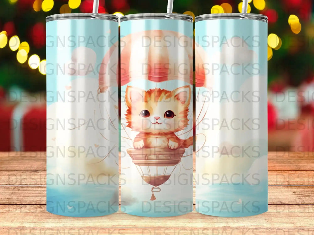 Cute cartoon kitten in a hot air balloon with "DESIGNSPACKS" text.