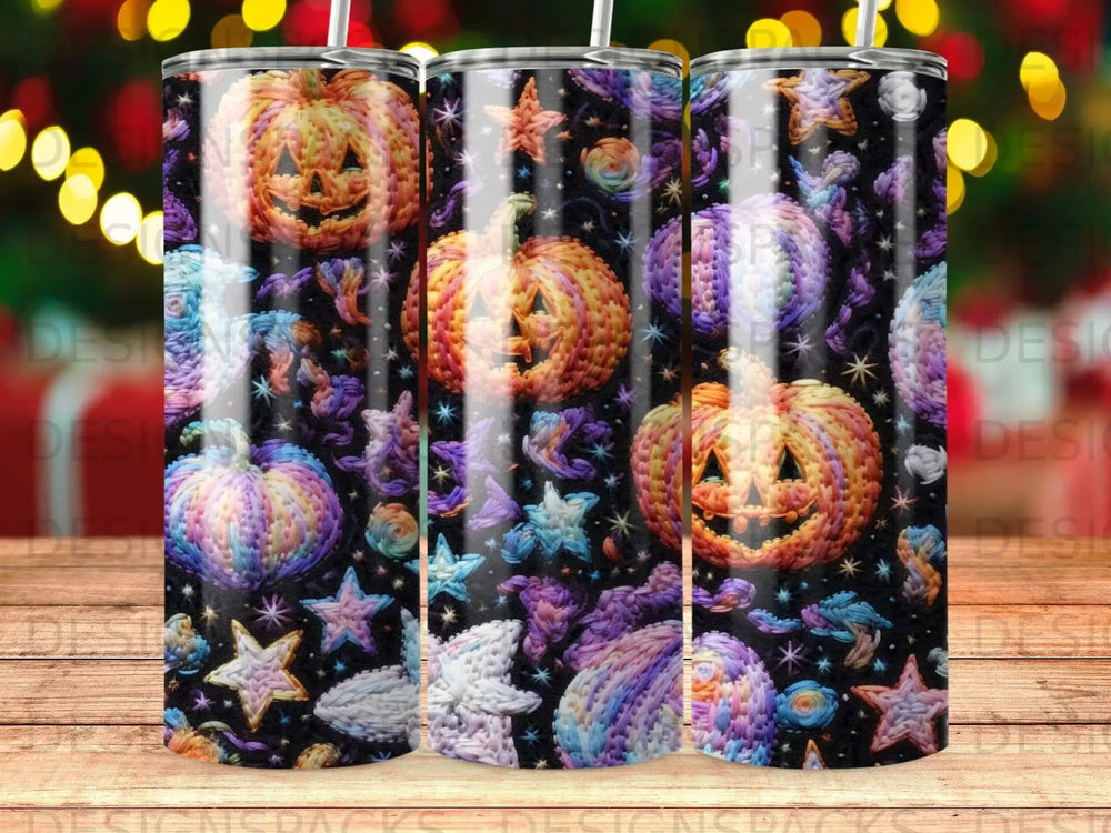 Halloween tumbler with pumpkins, stars, and celestial designs.