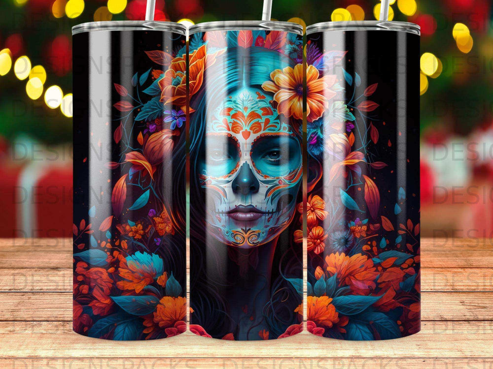 Sugar skull with vibrant floral patterns, presented on three tumblers.