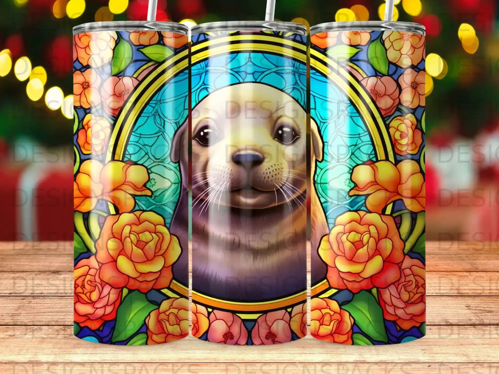 Seal head within a stained-glass floral frame, on a tumbler.