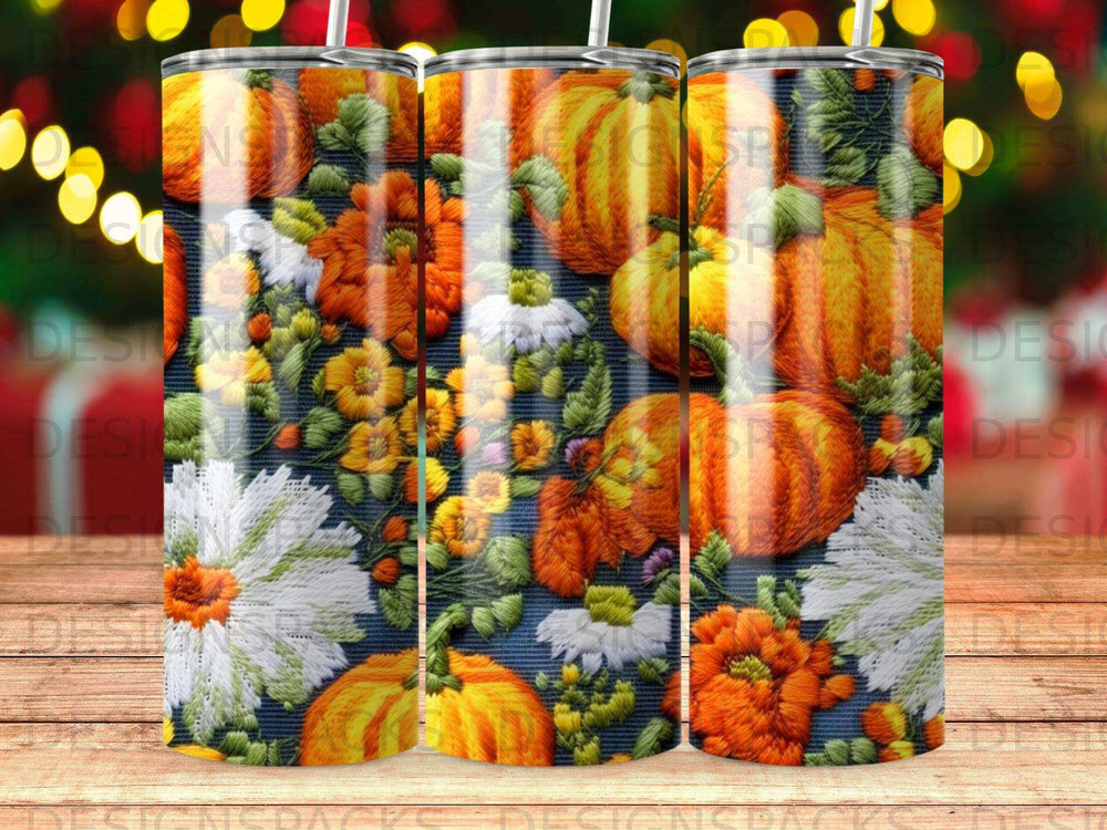 Pumpkin and floral embroidered pattern on a tumbler.