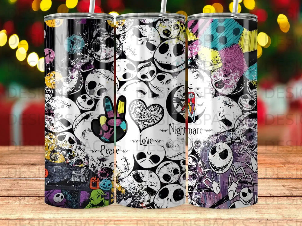 Three Halloween-themed tumblers featuring skulls, Jack Skellington, and patchwork designs.
