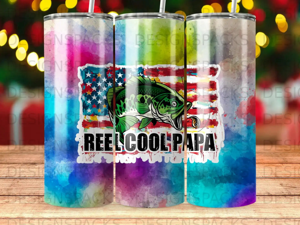 American flag tumbler with fish, "Reel Cool Papa" text, and watercolor background.