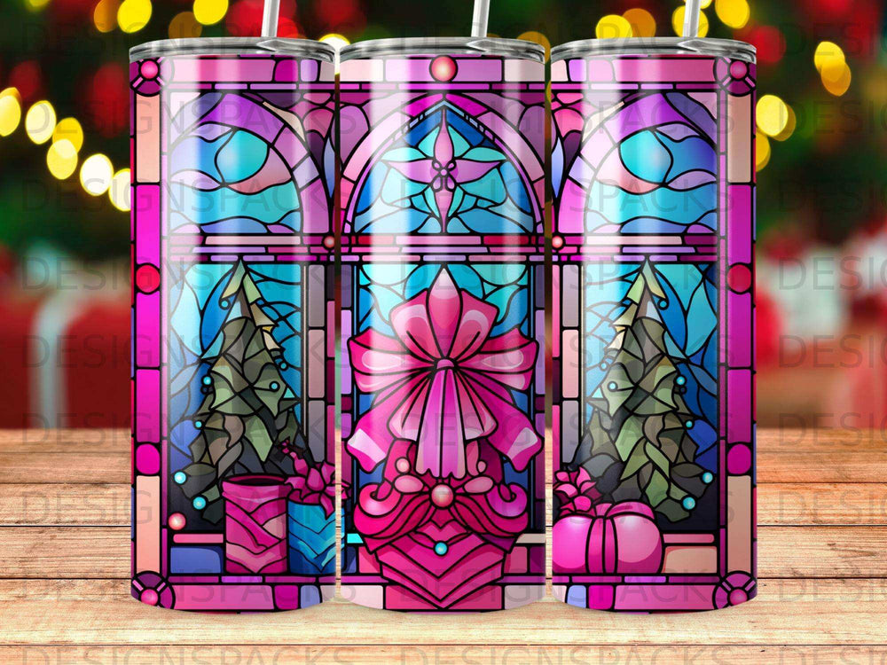 Stained glass tumbler with pink bow, Christmas tree, and gifts.