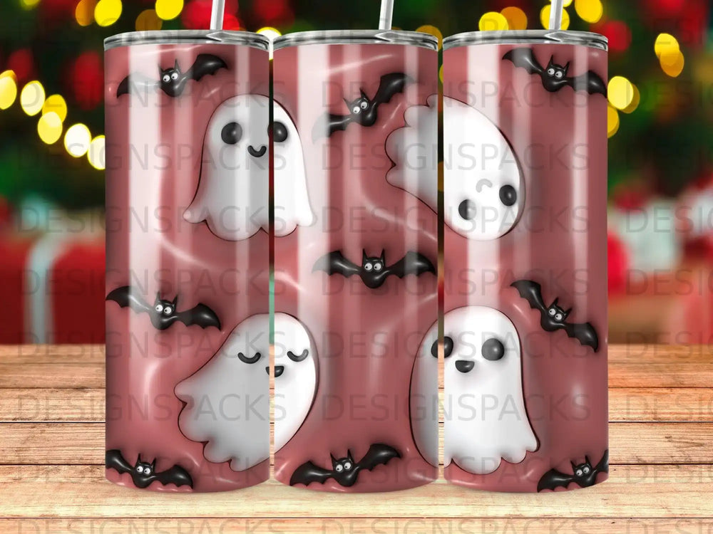 Halloween tumblers with bats, ghosts, and pumpkins.