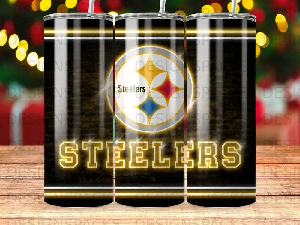 Pittsburgh Steelers logo and text on a black and gold striped tumbler.