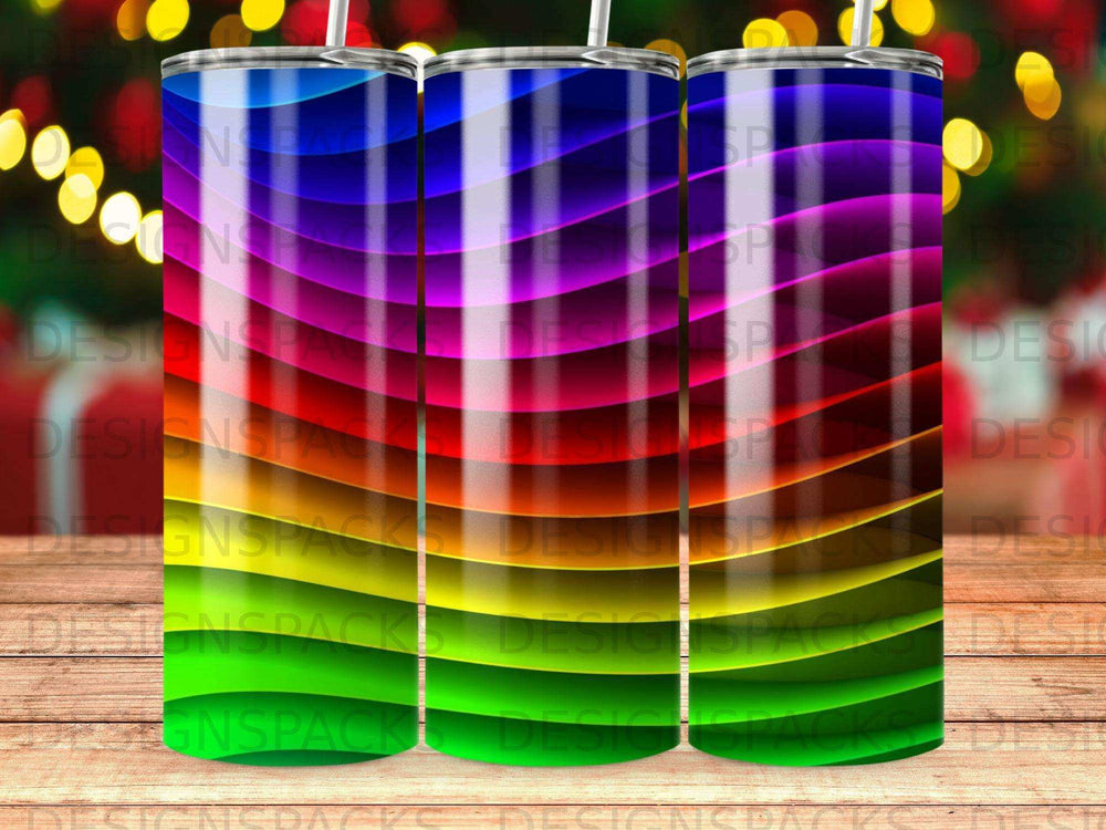 Three tumblers with a wavy rainbow striped pattern.