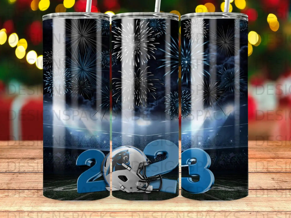 Carolina Panthers helmet and 2023 text with fireworks over stadium.