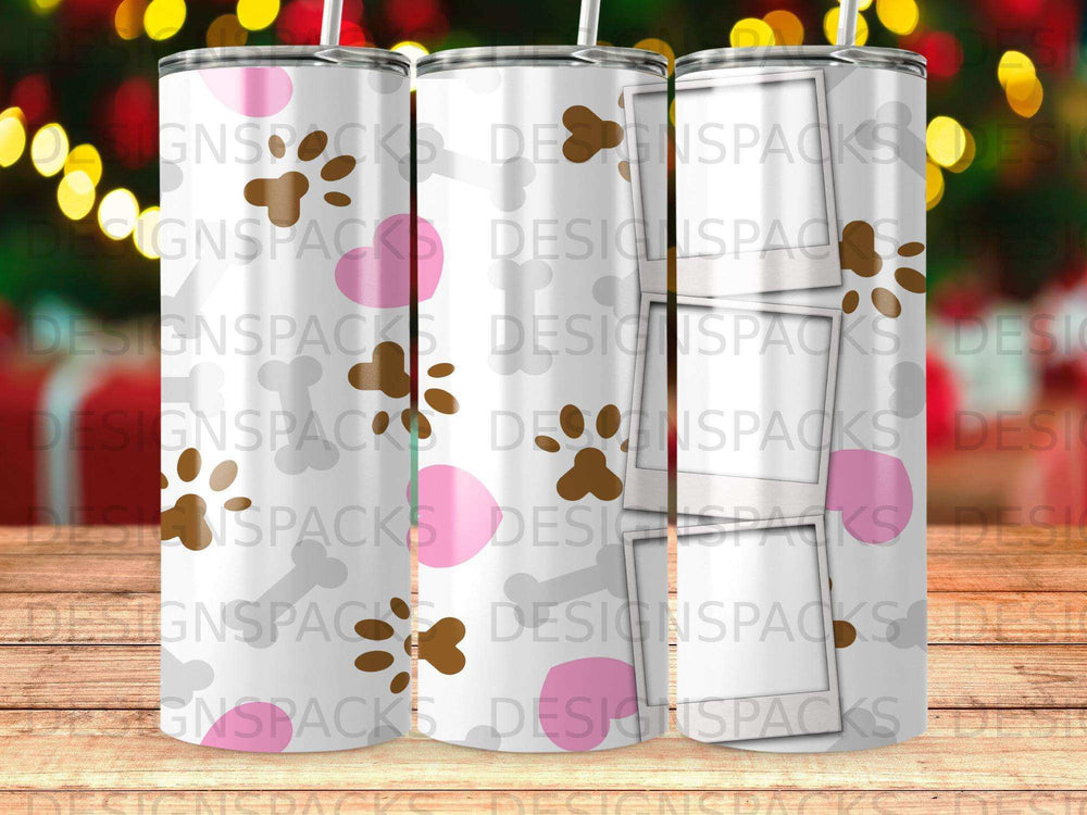 Three tumblers with a pink and brown paw print pattern.