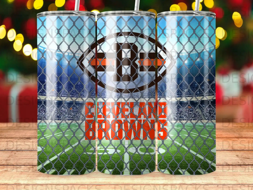 Cleveland Browns logo and team name on a stadium background behind a chain link fence.