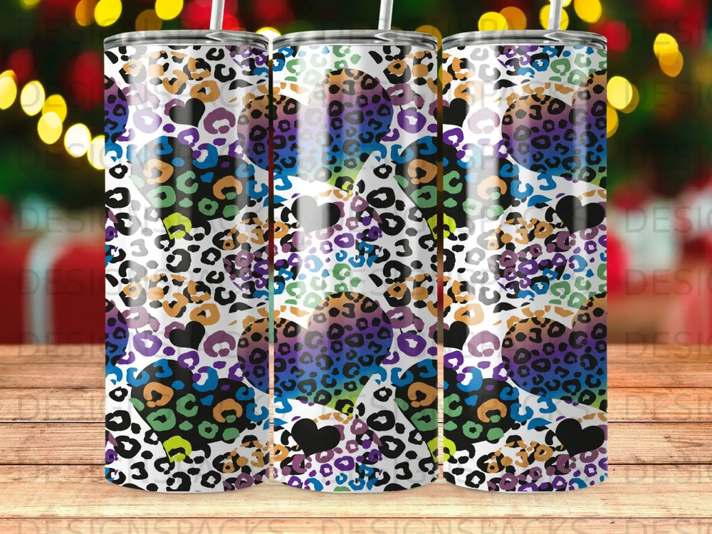 Tumbler with colorful leopard print and heart patterns.