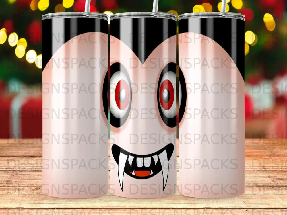 Vampire face with fangs on a patterned tumbler.