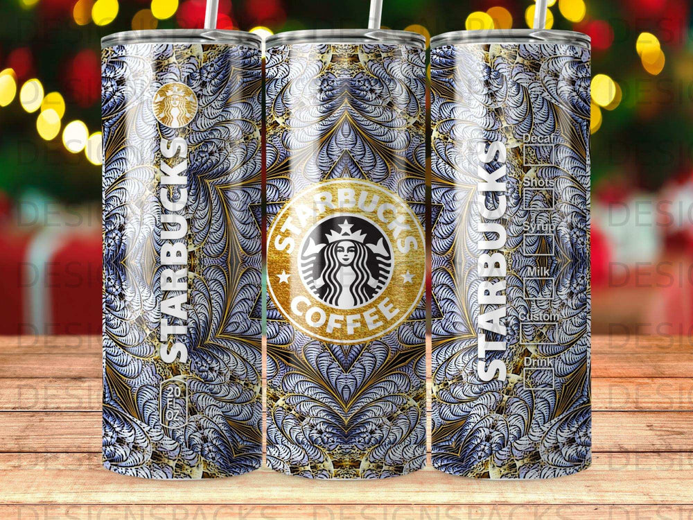 Starbucks coffee tumbler with ornate gold and blue pattern.