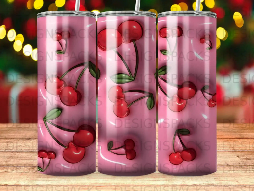 Tumbler with pink background and repeating cherry pattern.