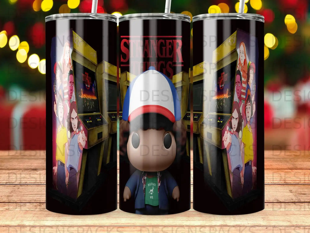 Stranger Things arcade game and characters on a tumbler.