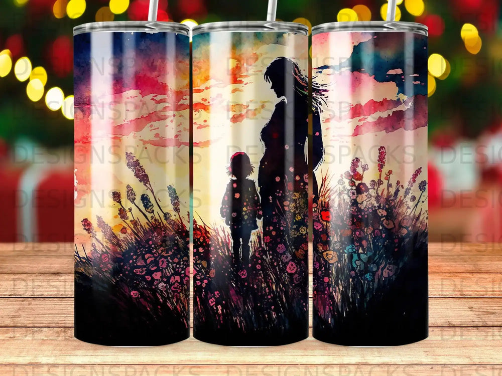 Silhouette of mother and child in a field of flowers at sunset.