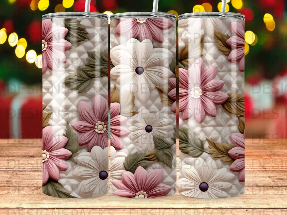 Floral pattern tumbler with pink and white flowers and green leaves.