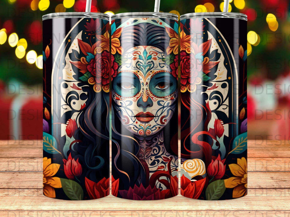 Day of the Dead skull art tumbler with colorful floral designs.