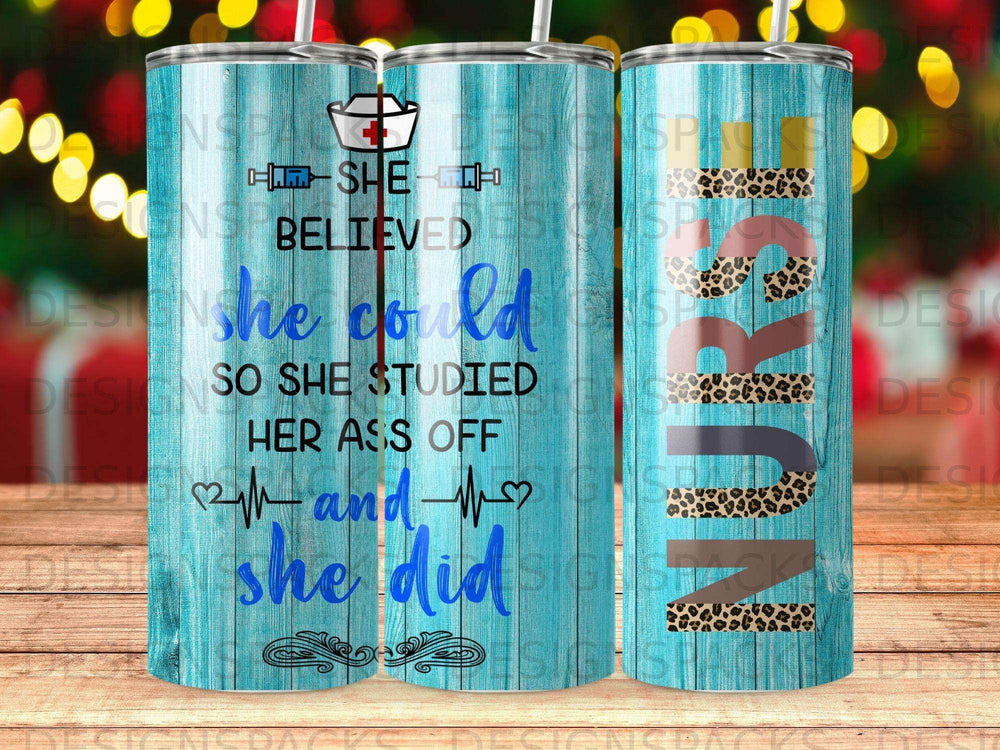 Tumbler with "She believed she could so she studied her ass off and she did" and nurse-themed graphics.