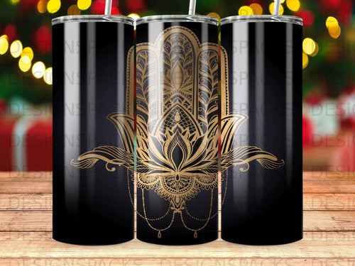 Black tumbler with gold mandala and hamsa hand design.