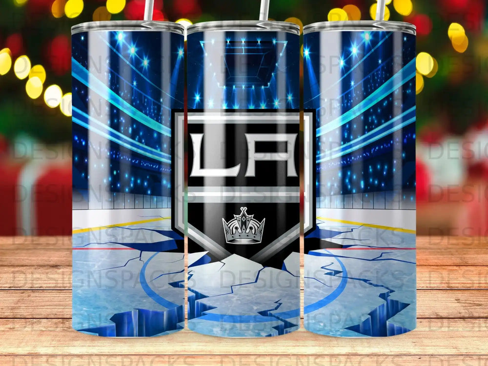 Los Angeles Kings hockey arena with "LA" logo on ice.