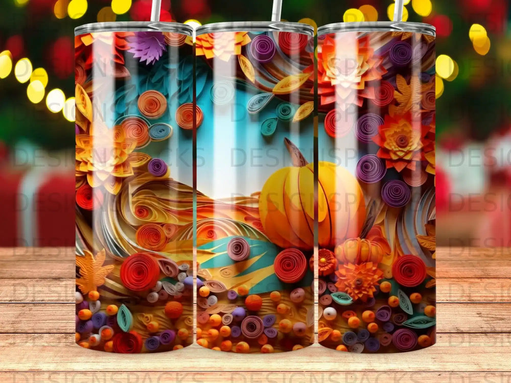 Tumbler with autumnal quilled paper art featuring pumpkins, leaves, and colorful swirls.