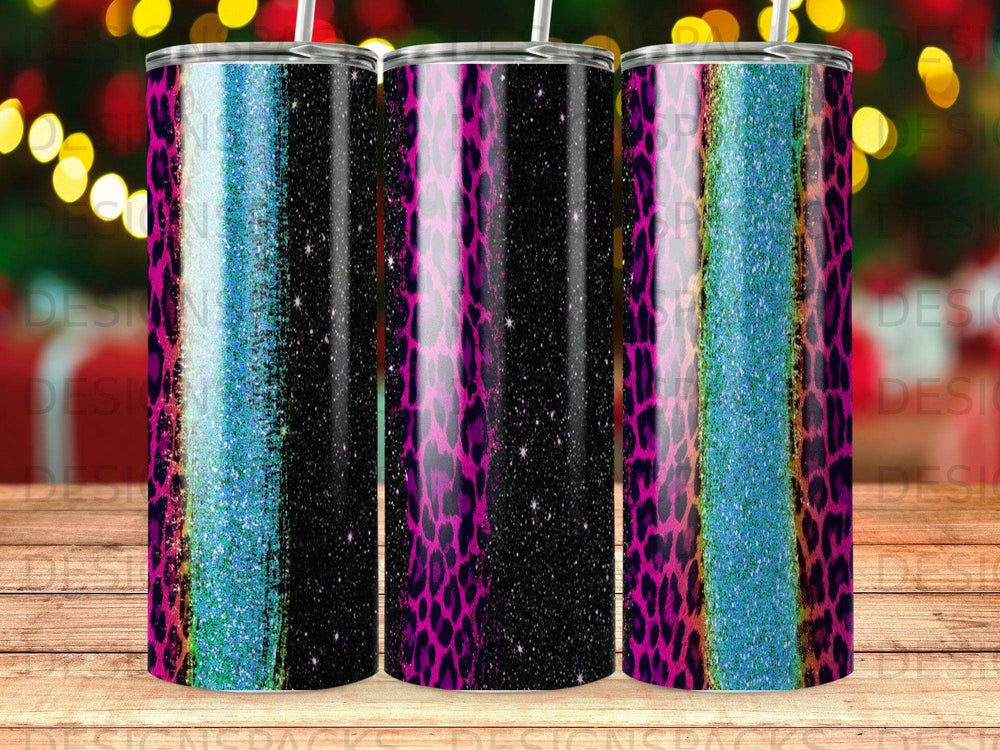 Glitter and leopard print tumbler with a black speckled background.
