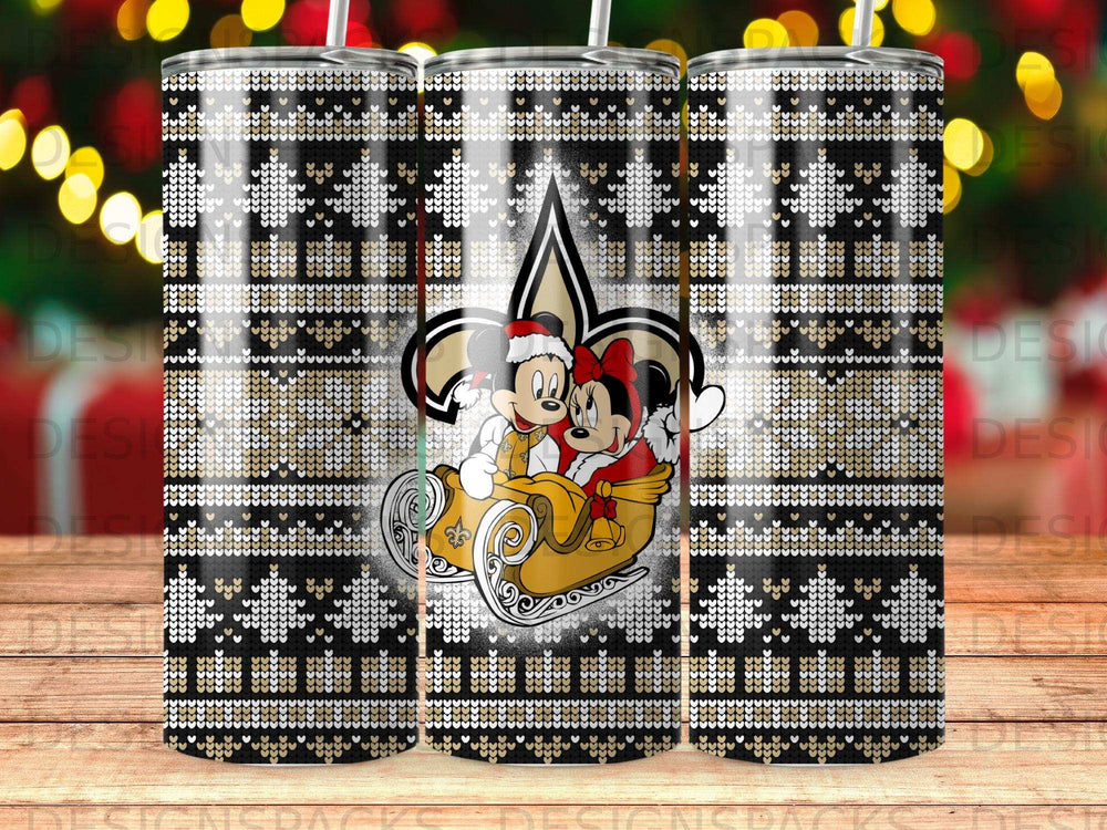 Mickey and Minnie Mouse in a sleigh on a Christmas-themed tumbler.