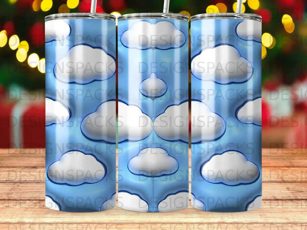Blue tumbler with cartoon clouds and sky pattern.