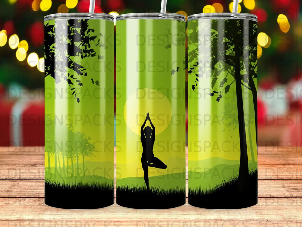Three tumblers with a silhouette of a person in a yoga pose against a sunset.