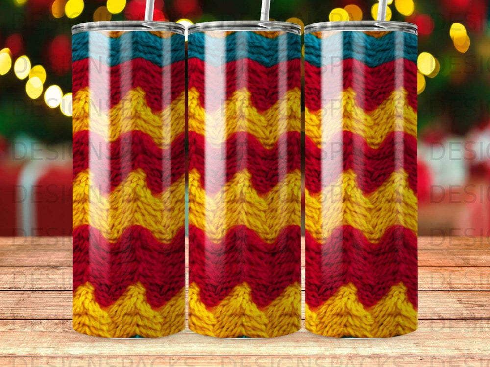 Three tumblers with a red, yellow, and blue zigzag knit pattern.