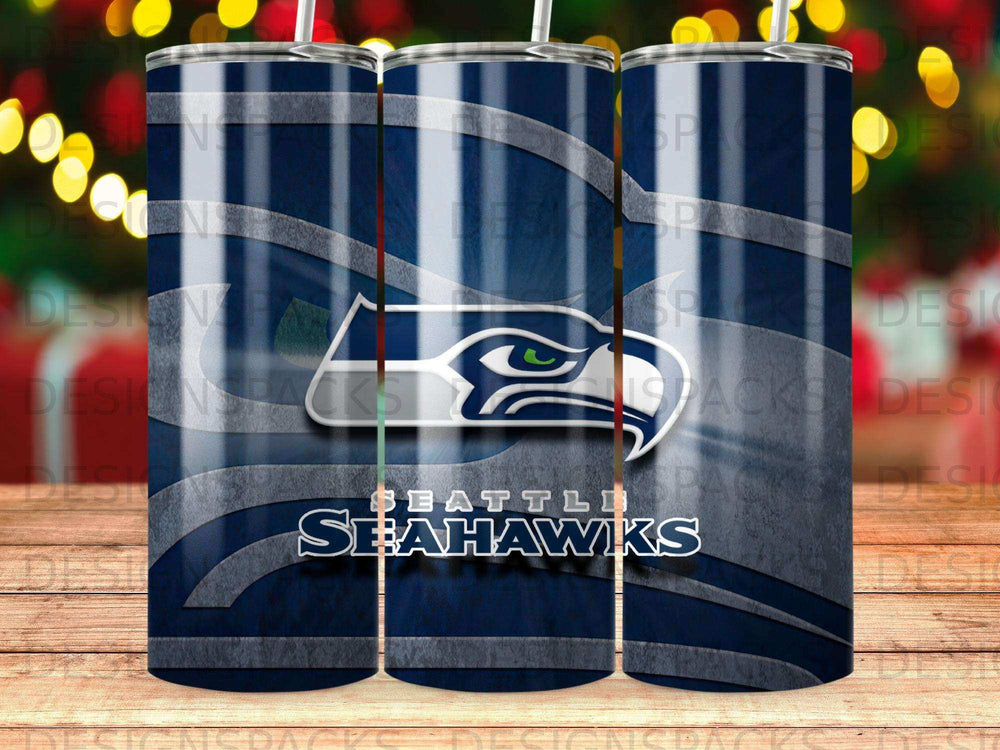 Seattle Seahawks logo on a blue and silver striped tumbler.