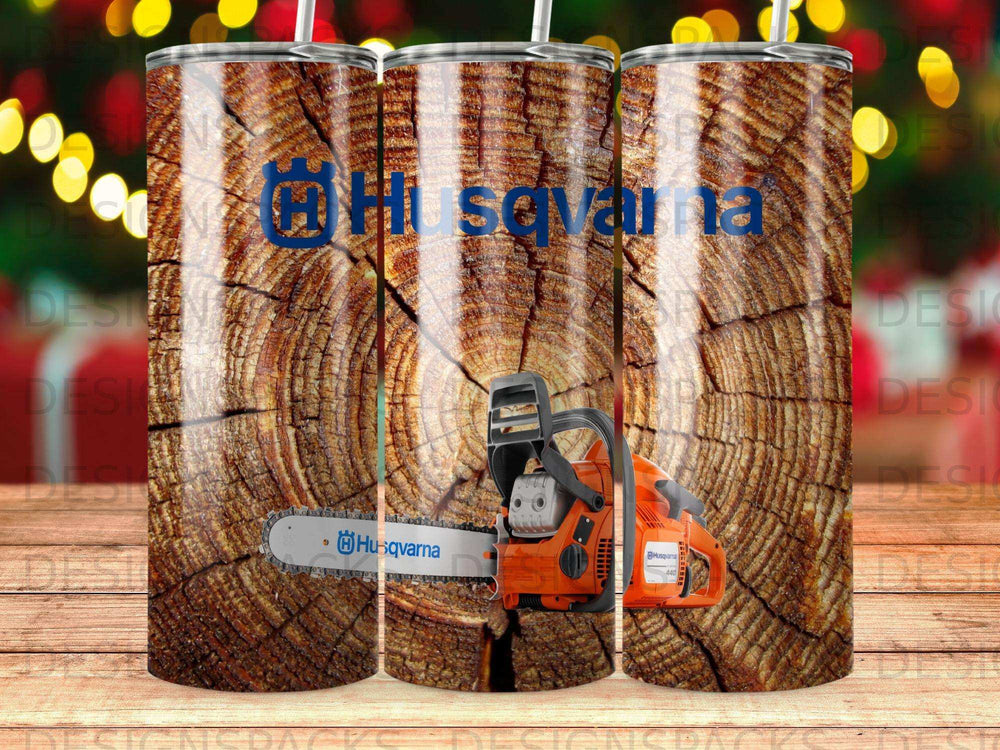 Husqvarna chainsaw on a wood grain tumbler.