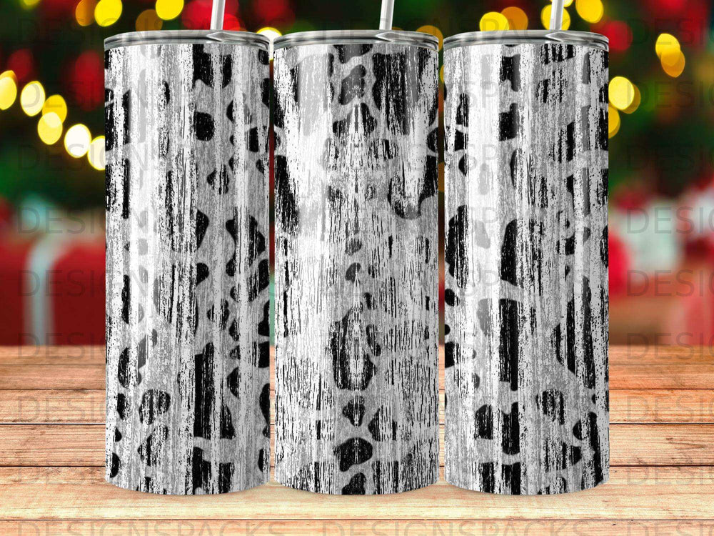 Three tumblers with black and white textured animal print design.