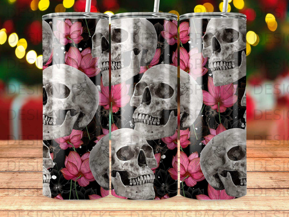 Skulls and pink flowers on a black background tumbler.
