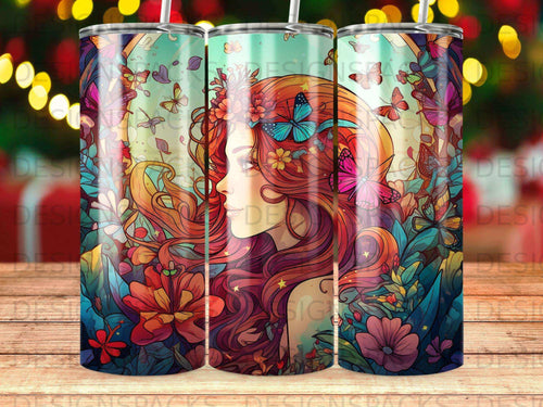 Fantasy woman with butterfly and floral details on a patterned tumbler.