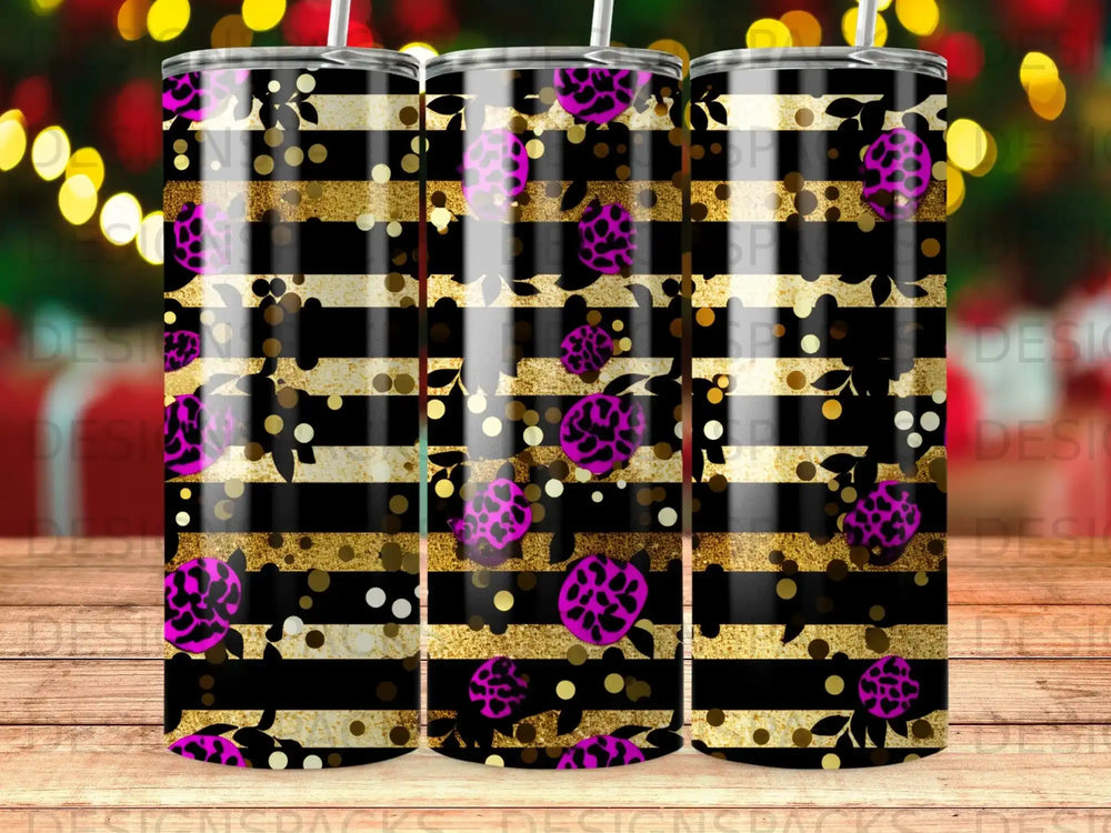 Tumbler with black, gold, and pink floral pattern.