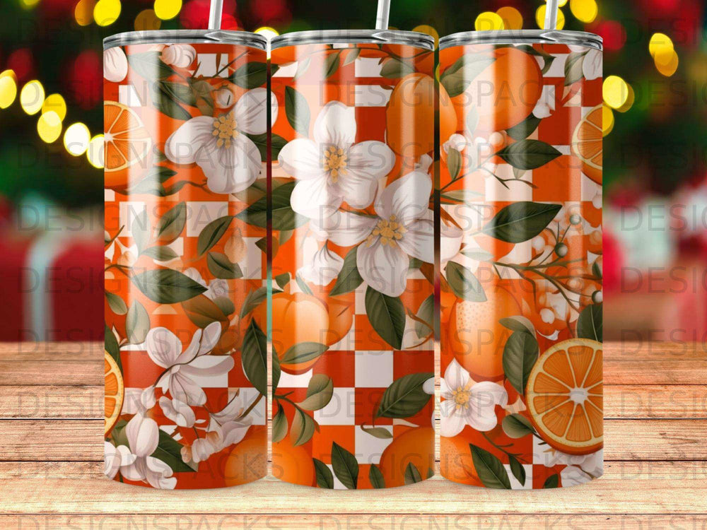 Orange slices and white blossoms on an orange and white checkered background.