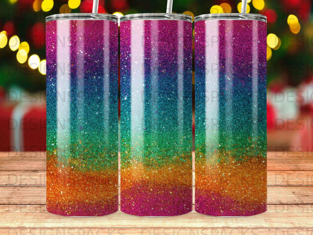 Three tumblers with a multicolored glitter gradient design.