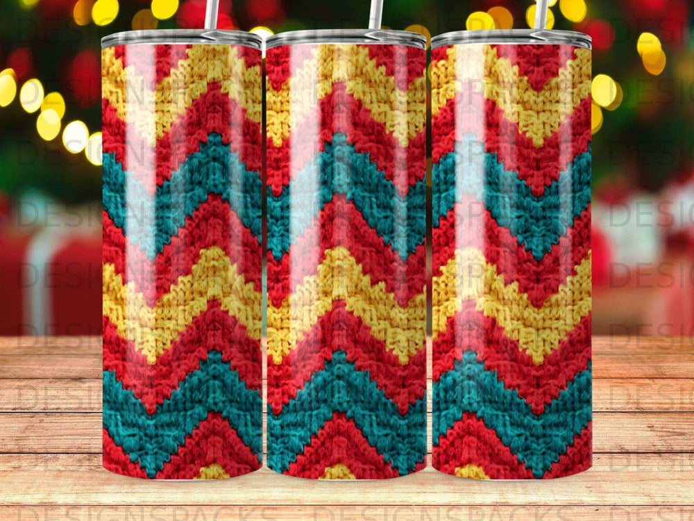 Zigzag knitted pattern in red, yellow, and teal on three tumblers.